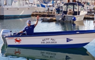 A man on the water in Newport, Oregon, utilizing boat rentals.