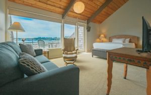 A guestroom in a Newport resort to relax in while checking the climate and weather in the Oregon town.