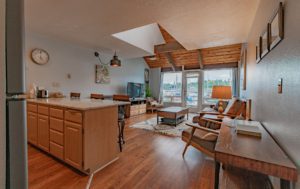 The living space of a room in Newport resort near the aquarium.