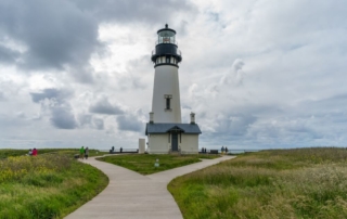 A trail around a lighthouse near Newport, one of the best Oregon coast hikes.
